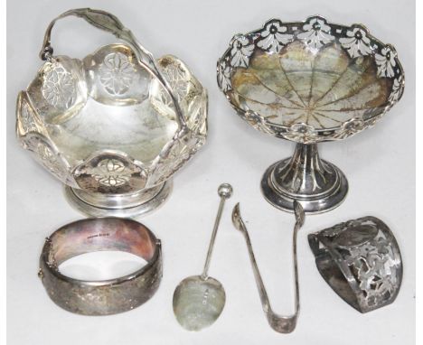 A mixed lot of hallmarked silver comprising a basket with swing handle, a pedestal dish, a pair of sugar tongs, a serviette r