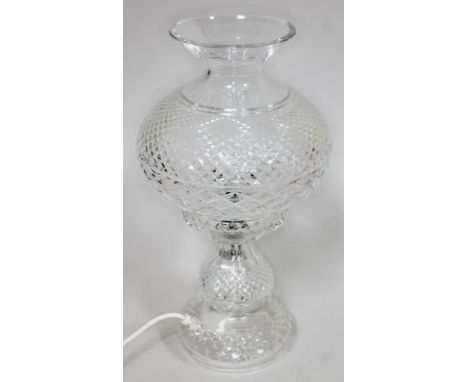 A Waterford cut glass table lamp in two sections, height 48cm.  Condition - good, appears free from any chips or cracks, mino