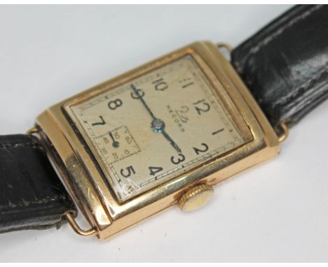 An Art Deco Record Watch Co 9ct gold manual wind wristwatch with signed silver dial, black Arabic numerals, hands and seconds