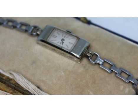 A ladies vintage Carl F. Bucherer 14K white gold 17 jewel manual wind cocktail watch on stainless steel adjustable bracelet, 