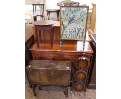 A tapestry fire screen, an oak cake stand, an Edwardian gate leg table and a small mahogany round table