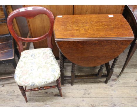 An oak barley twist gate leg table and a small Victorian upholstered chair