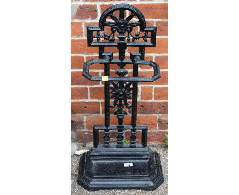 A black cast iron stick stand