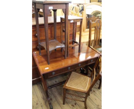 A reproduction mahogany sofa table, two oak tables and a rattan seat chair