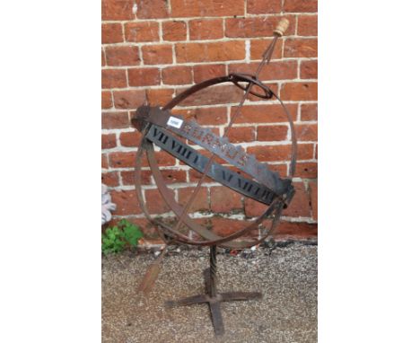 A metal weather vane garden sculpture