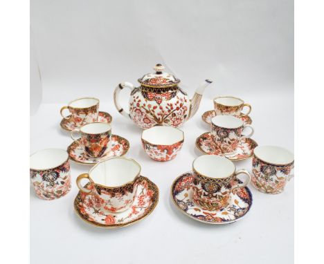 Royal Crown Derby teapot and sugar basin and a harlequin collection of 8 coffee cans and saucers  Condition - teapot cracked,