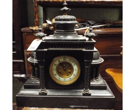 Large black marble mantel clock with striking movement 15" wide x 15" high 