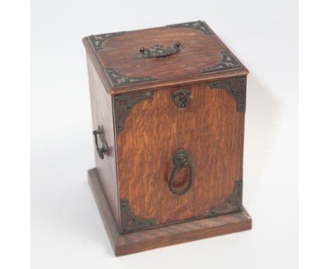 Late Victorian oak tea caddy with fall down front and metal liner. 8.5" high   Condition - handle for one side is inside box 