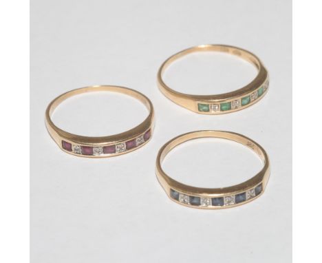 Three matching ladies 18ct gold half hoop rings, each set with ruby & diamond, sapphire & diamond and emerald and diamond. Al