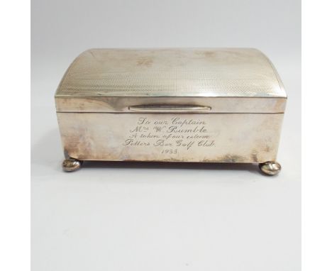 1930's silver cigarette box with engine turned decoration to the lid, engraved 'To our Captain Mrs W Rumble, a token of our e