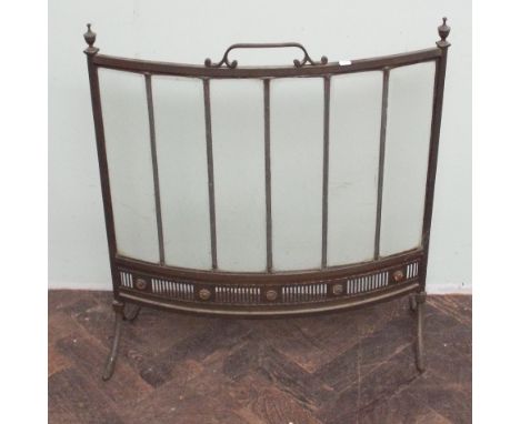 late 19th century brass framed glazed fire screen of convex form, with bevelled glazing. 