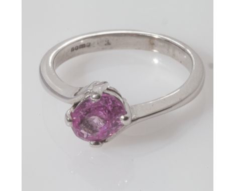 9ct white gold pink sapphire ladies dress ring, set with an oval claw set sapphire, ring size K