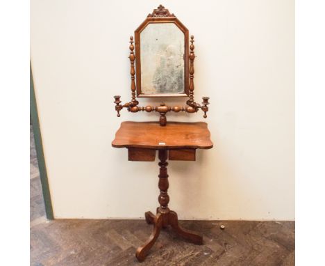 Late Victorian walnut dressing table fitted drawers and candle brackets standing on a pillar and tripod base.  22" wide 16" d