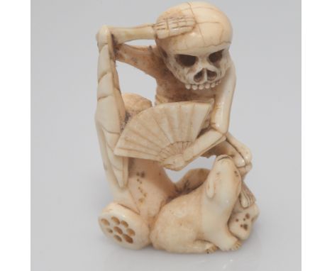 Early 20th C carved Japanese marine ivory macabre netsuke, 5cm high - possibly Walrus ivory  Condition - good overall. There 