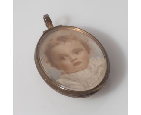 Oval 19th century portrait miniature on ivory of an angelic infant in gilt metal oval glazed locket, 3.5 cms long. 
