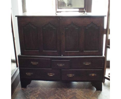 Antique oak two door milinary cabinet with fielded panel doors and five drawers under 56" wide x 51" high  Condition - sides 