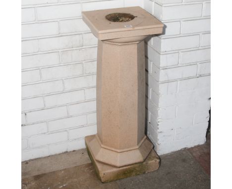 Cream reconstituted cream marble sundial face, 32" high