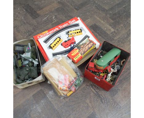 Collection of die cast model toys including tanks, some Dinky examples, painted lead farm animals and a Triang/Hornby clockwo