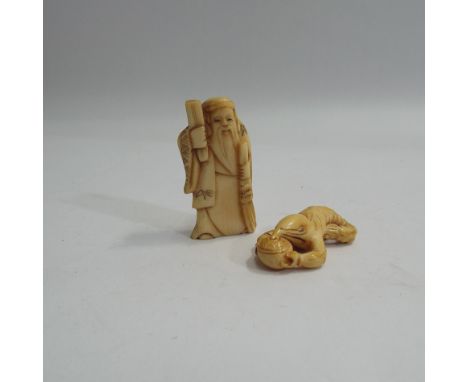 Two Japanese carved ivory netsuke, one crayfish 4.5cm long, the other an old sage 5.5cm high, both signed    Conditon - good