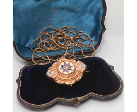 Victorian gold blue enamel and seed pearl pendant/brooch/locket on very long fine mesh guard chain. Clasp stamped 9ct.  Gross