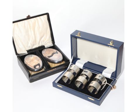 Set of 6 silver engine turned napkin rings, hallmarked for Birmingham, cased, weighing apprx 4oz and a pair of silver backed 