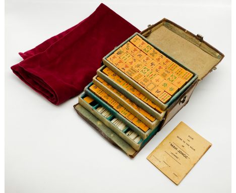 VINTAGE CASED MAH-JONGG GAME WITH GAMING CLOTH AND ADDITIONAL BOOK ABOUT THE GAME ACCEPTABLE CONDITION
