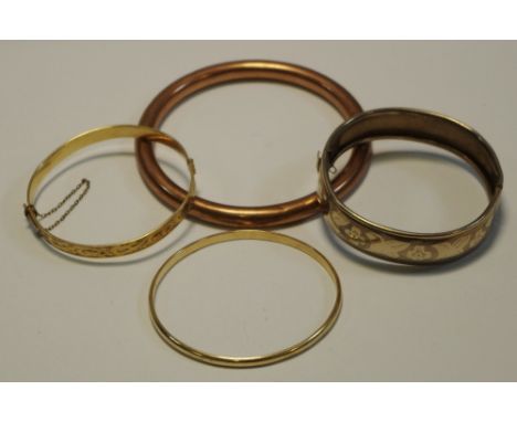 A 9ct Rose Gold Hollow Bangle 16.9g, a 9ct gold metal case hinged bangle, a yellow metal hinged bangle, stamped Hong Kong SSS