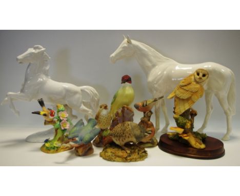 A Royal Worcester Woodpecker, 3249; Staffordshire Goldfinch; others, Chaffinch; Quail; a Beswick white mare etc.