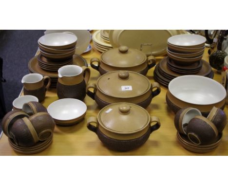 A Denby Cotswold Dinner and Tea Service, comprising four tureens, six dinner plates, seven medium plates, seven small plates,