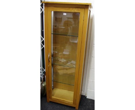 A Contemporary Light Oak Display Cabinet, bevelled panelled glass sides, three glazed shelves.