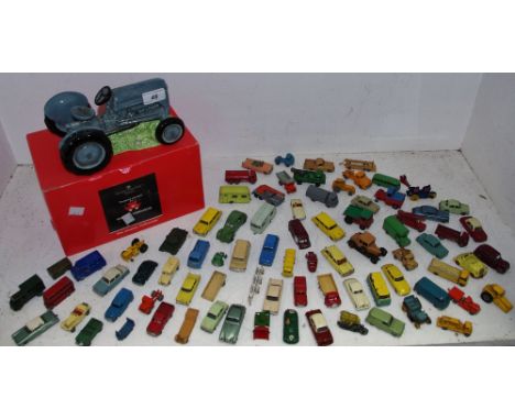 A Border Fine Art money box in the form of a tractor, boxed; various miniature vehicles by Lesney including Aston Martin No.5