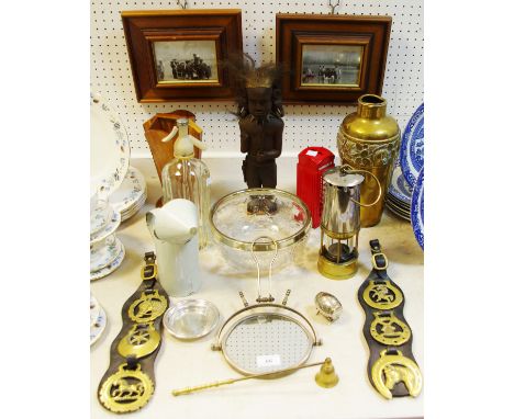 A miner's safety lamp; horse brasses; brass vase; native figure; Sutcliffe prints
