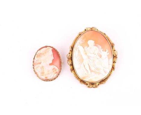 A Victorian shell cameo, the oval panel carved with St Luke seated on a bull, within a landscape, to a yellow precious metal 