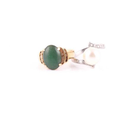 A jade and diamond ring, to a tapering yellow precious metal mount, stamped '750 Z.H 18k', ring size K; and a cultured pearl 