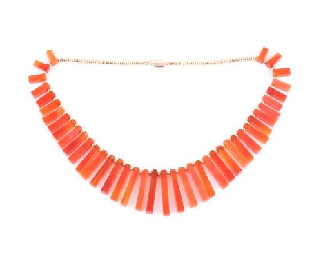 An Art Deco style carnelian fringe necklace, set on a beaded chain with 14ct gold clasp, 38 cm long.