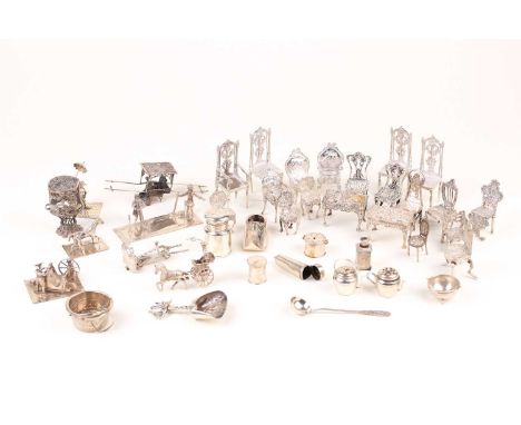 A collection of forty mostly Dutch miniature silver "Toys", 19th/ 20th century, to include high backed chairs, tables golfing