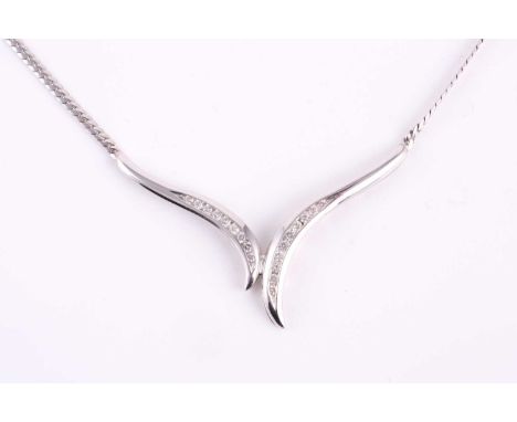 A 9ct white gold and diamond necklace, channel set into the V drop, are round brilliant cut diamonds of an estimated weight o