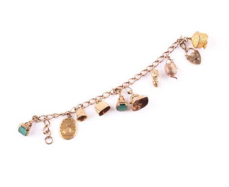 A 9ct gold charm bracelet with charms, consisting of an 18.5cm long curb link chain with heart shape padlock with nine suspen