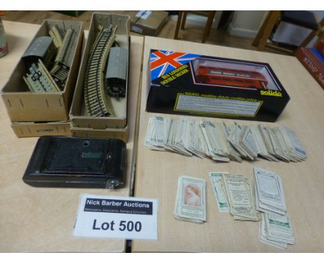 Die-cast : Mixed lot - model bus, Marklin train wagon x 2 and track, boxed camera and a bunch of cigarette cards.
