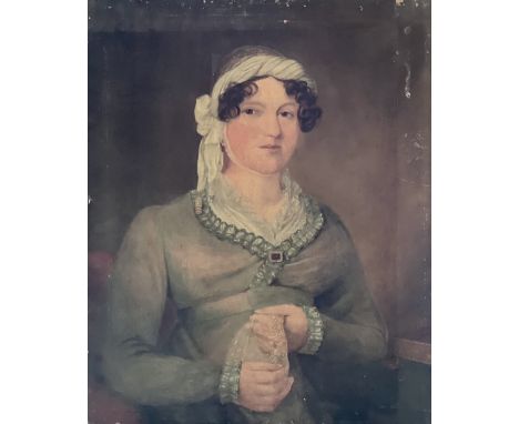 English School, circa 1830, portrait of a young lady, half length, in a green dress and silk bonnet, oil on canvas. 76cm H x 