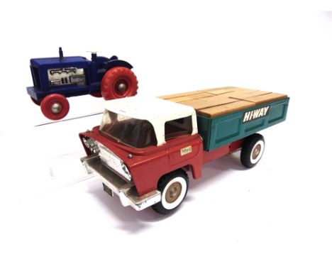 A TRI-ANG 'HI-WAY' PRESSED STEEL LORRY  with a red lower cab and chassis, white upper cab and metallic green rear, complete w