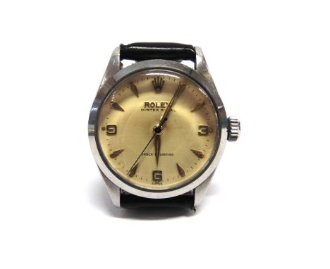 ROLEX, OYSTER ROYAL, A GENTLEMAN'S STAINLESS STEEL SMALL SIZED MCHANICAL WRISTWATCH  the off white lightly textured dial with