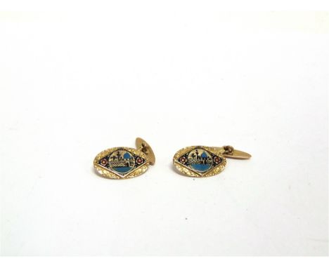 A PAIR OF EASTERN CUFFLINKS  unmarked, the oval panels enamelled with a Mosque, 10g gross