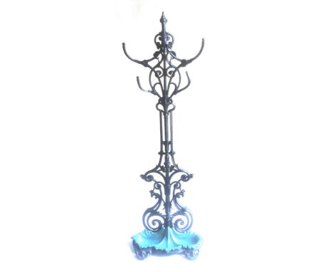 A VICTORIAN COALBROOKDALE STYLE CAST IRON STICK STAND  the shell shaped removable drip tray with diamond registration mark, 1