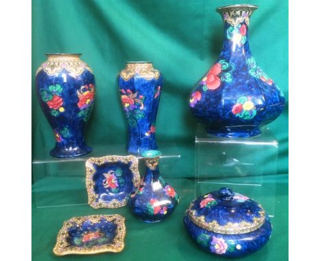 A GROUP OF KEELING & CO LTD 'LOSOL WARE' ITEMS  in 'Magnolia' pattern, each with coloured floral decoration on a blue ground,