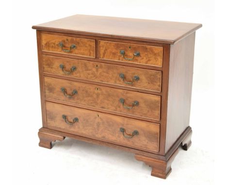 Georgian style small mahogany chest of drawers, the moulded top over two short and three long graduated drawers, upon ogee br
