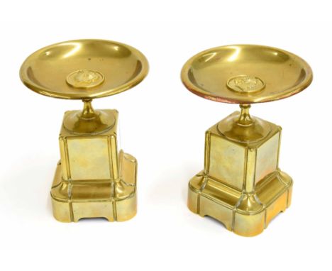 Pair of Classical brass tazzas, each bowl inset with a repousse classical portrait, raised on square bases, 7" high, 5.5" dia