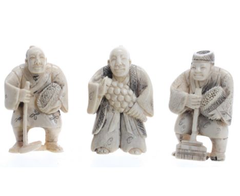 Three Japanese ivory netsuke each modelled with stand men, each 2" high (3)