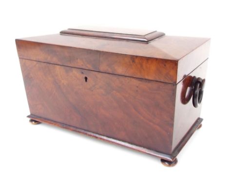 Victorian mahogany sarcophagus shape tea caddy, the hinged cover enclosing divided interior with twin lidded containers, 12" 