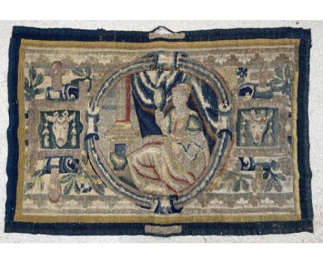 18th century figural tapestry wall hanging, decorated with a seated lady holding a vanity mirror, within a cartouche border, 